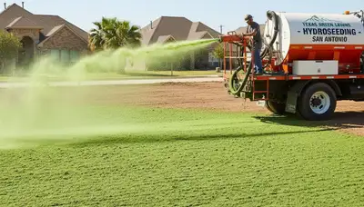 Hydroseeder truck spraying green slurry for new lawn installation in San Antonio, TX landscaping project