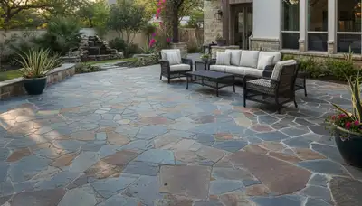 Flagstone patio with natural slate pavers installed by Chop Chop Landscaping in San Antonio, TX